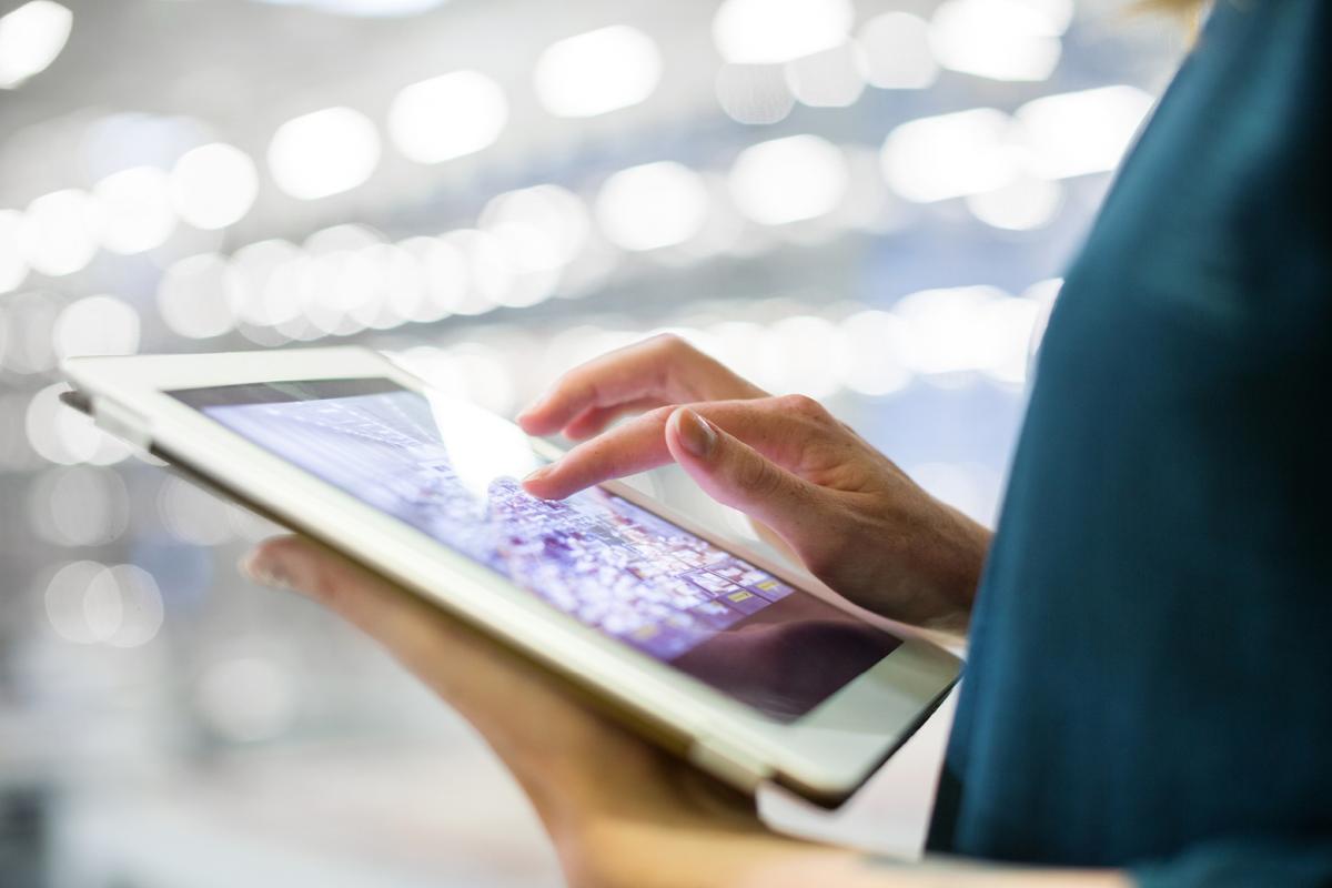 Woman holding tablet