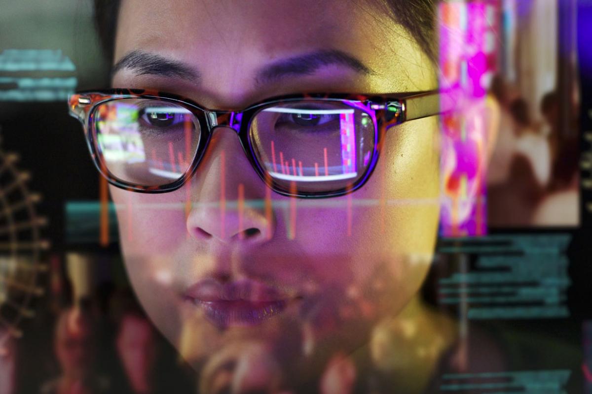 Woman looking at visual display of data