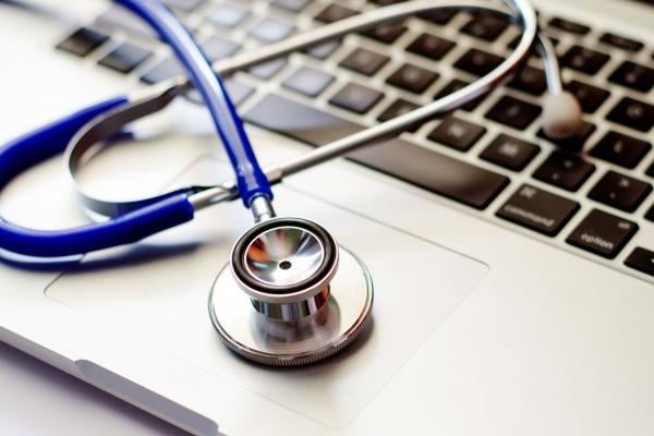 stethoscope on laptop