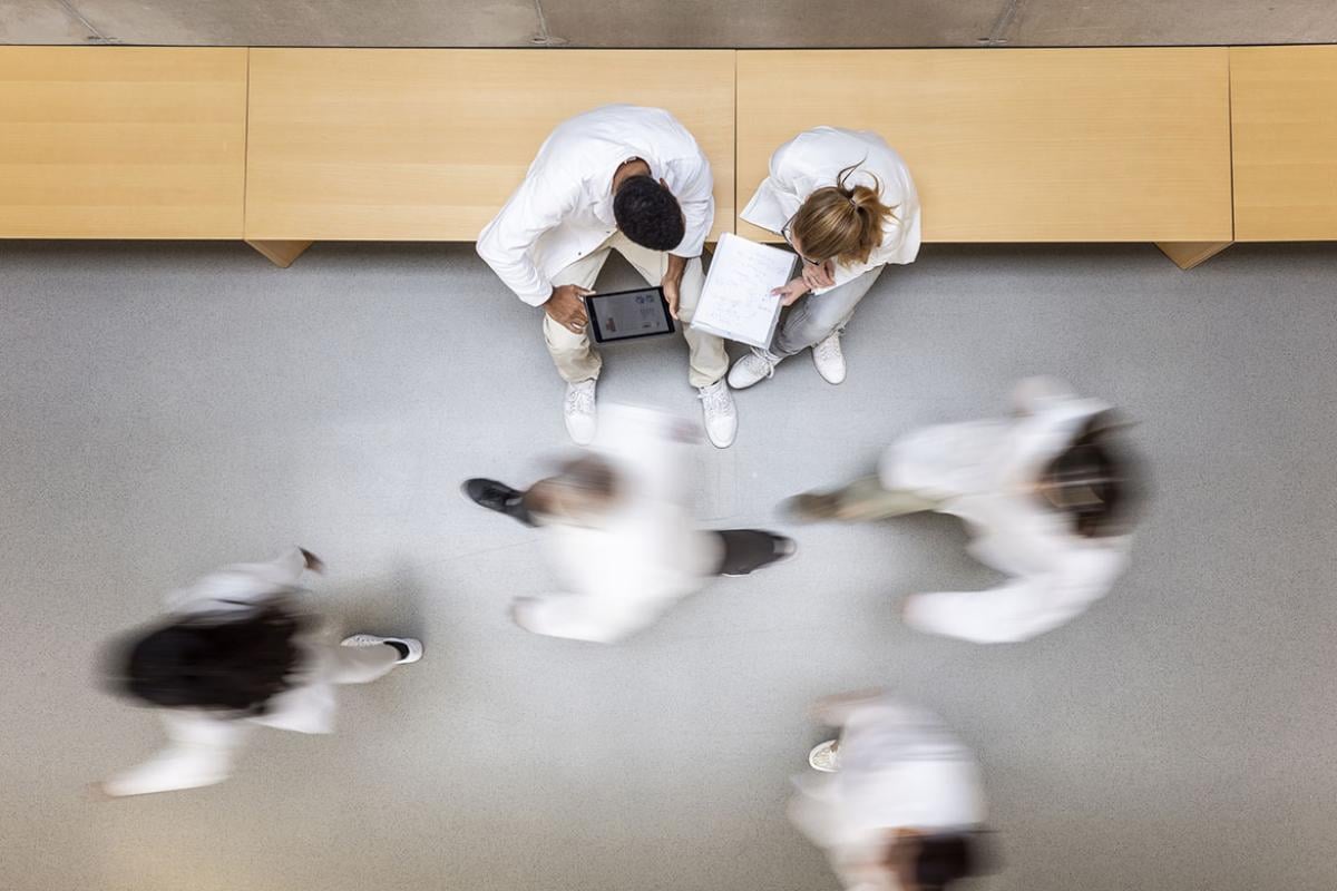 People walking in a corridor