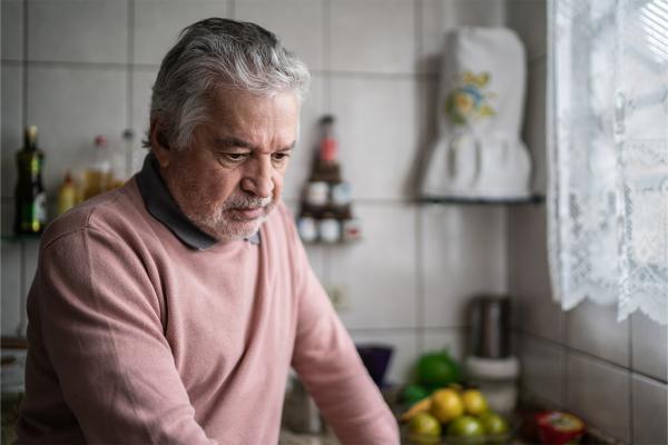 Older man looking pensive/frustrated