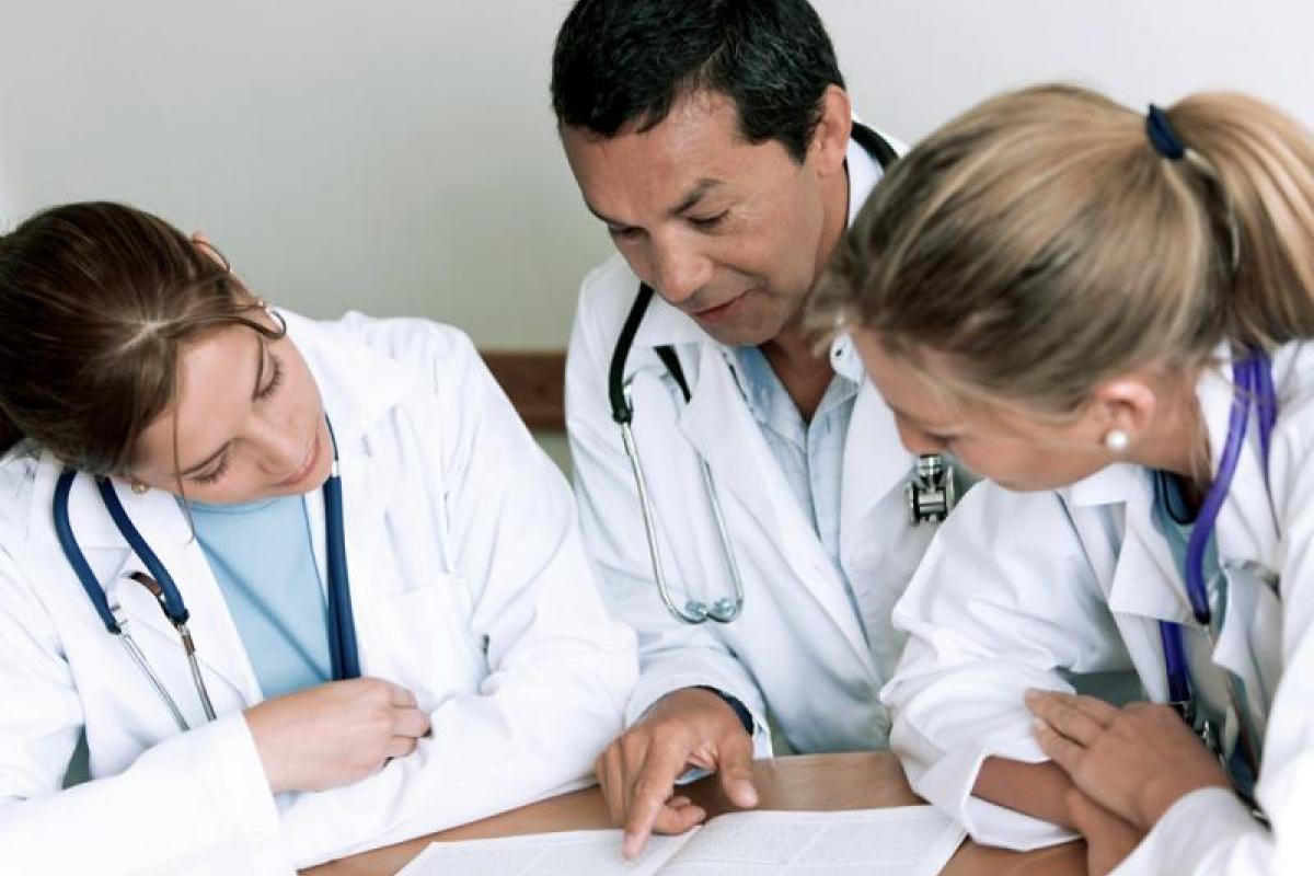 Doctors working at a table