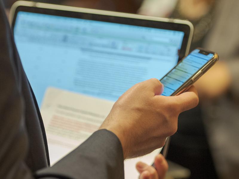 Member on mobile phone at AMA Meeting