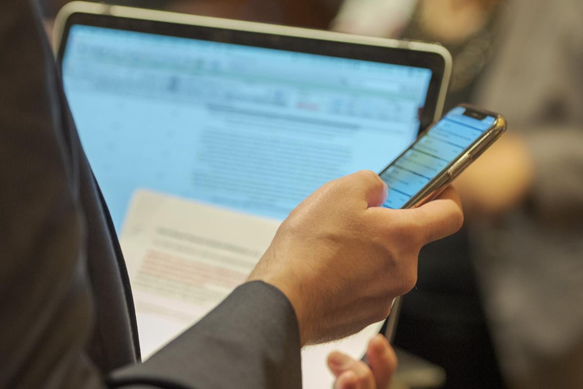 Member on mobile phone at AMA Meeting