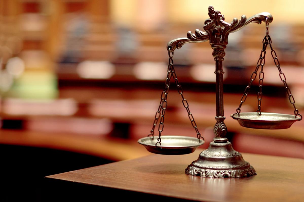 Scales of Justice on desk